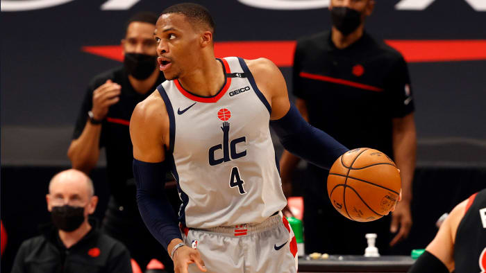 Wizard point guard Russell Westbrook dribbles a ball.